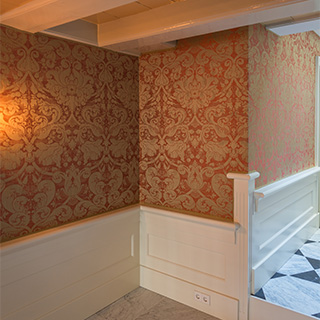 stoffen wandbespanning aangebracht in souterrain Keizersgracht Amsterdam